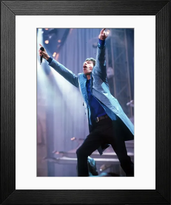 Framed Print : Rolling Stones in concert at Wembley Stadium 12th June 1999 Mick Jagger Arms aloft Framed Print : Rolling Stones in concert at Wembley Stadium 12th June 1999 Mick Jagger Arms aloft