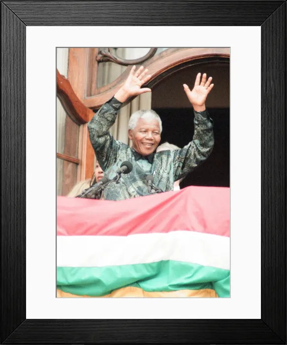 Framed Print : South African President Nelson Mandela waving to the crowds from the balcony of South Framed Print : South African President Nelson Mandela waving to the crowds from the balcony of South