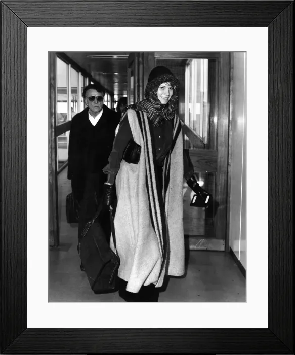 Framed Print : Richard Burton and his wife Suzy left London today for Geneva