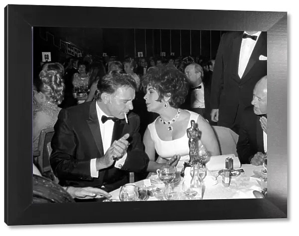 Richard Burton and Elizabeth Taylor seen here receiving best actor