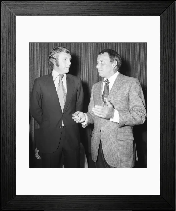 Framed Print : Footballer Bobby Moore chats with singing legend Frank Sinatra during the annual Frank