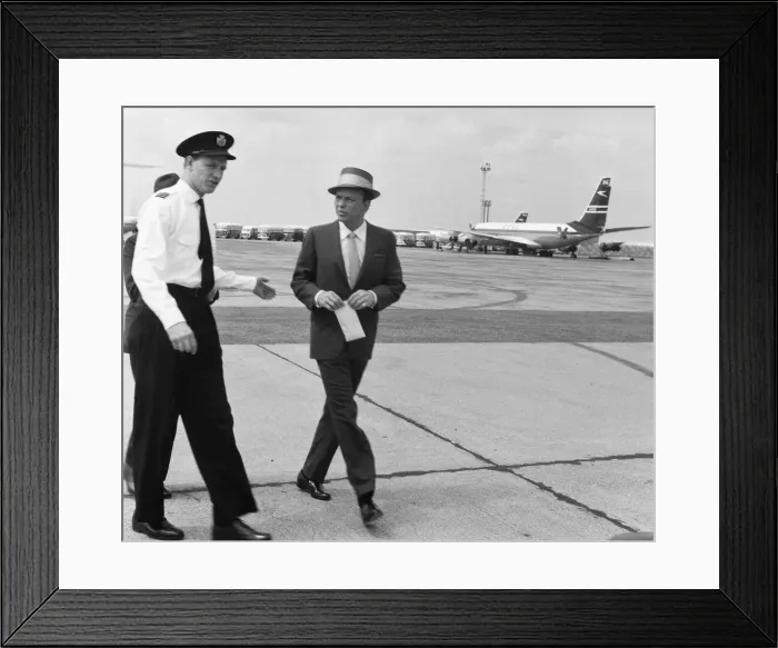 Framed Print : Singer Frank Sinatra seen here arriving at Heathrow Airport by helicopter