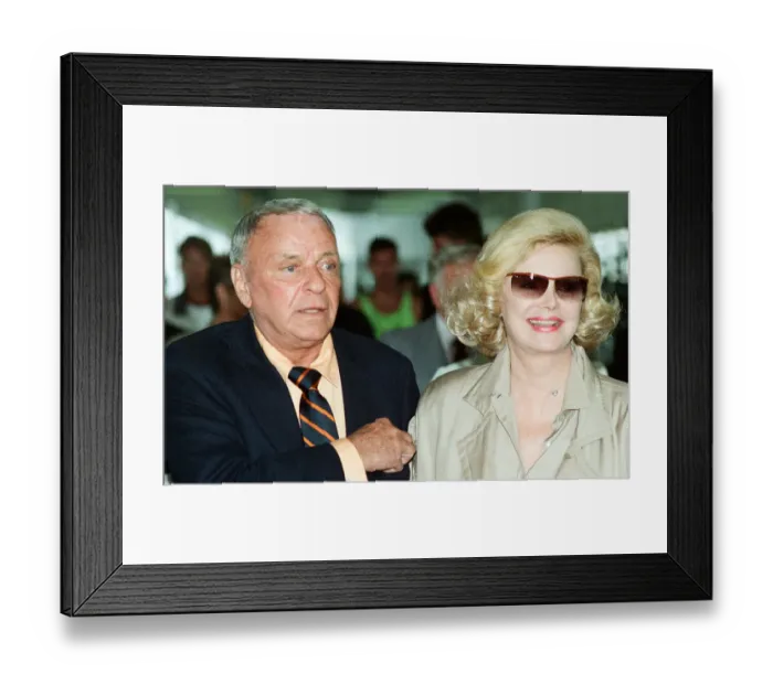 Framed Print : Frank Sinatra and wife Barbara Marx seen here arriving at Heathrow Airport 28th June 1990 Framed Print : Frank Sinatra and wife Barbara Marx seen here arriving at Heathrow Airport 28th June 1990