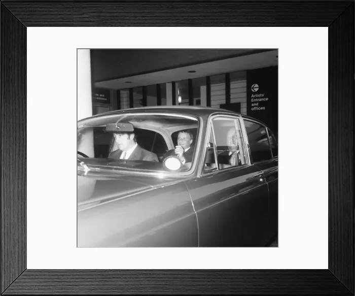 Framed Print : Singer Frank Sinatra pictured as he left the Festival Hall by Jaguar car with the rear Framed Print : Singer Frank Sinatra pictured as he left the Festival Hall by Jaguar car with the rear