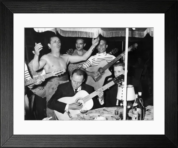 Framed Print : Frank Sinatra seen here playing the guitar during a gala party held by Grace Kelly in Framed Print : Frank Sinatra seen here playing the guitar during a gala party held by Grace Kelly in