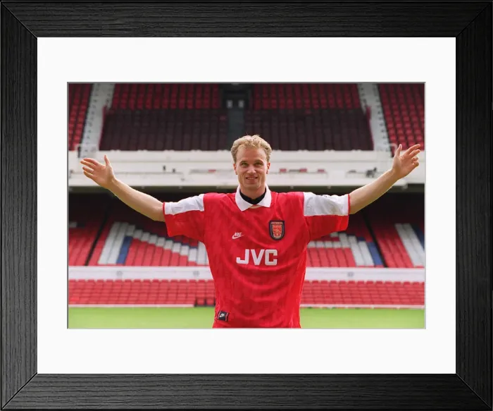 Framed Print : Dennis Bergkamp demonstrates the size of his fee after signing for Arsenal for £7 Framed Print : Dennis Bergkamp demonstrates the size of his fee after signing for Arsenal for £7
