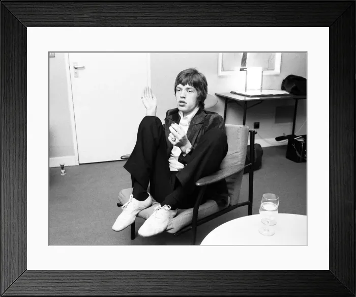 Framed Print : The Rolling Stones. Mick Jagger talks with the Press during a break in rehearsals