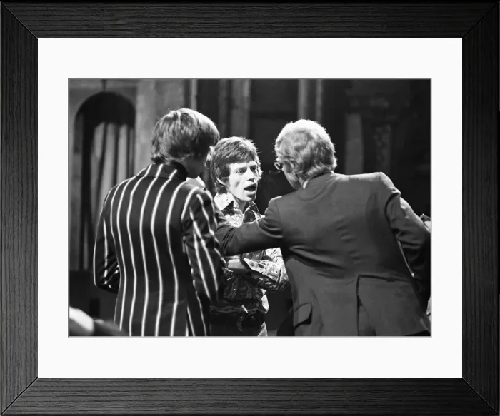 Framed Print : Mick Jagger talking to The Rolling Stones manager Andrew Loog Oldham (right