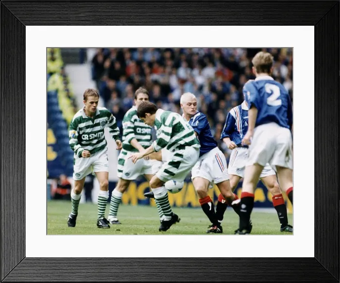 Framed Print : Paul Gascoigne of Rangers challenges Tosh McKinlay of Celtic in the Scottish Premier Framed Print : Paul Gascoigne of Rangers challenges Tosh McKinlay of Celtic in the Scottish Premier