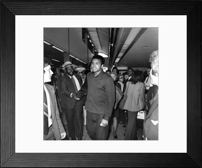 Framed Print : Boxer Cassius Clay. Heavyweight boxer Cassius Clay arrived at Heathrow Airport on his way Framed Print : Boxer Cassius Clay. Heavyweight boxer Cassius Clay arrived at Heathrow Airport on his way