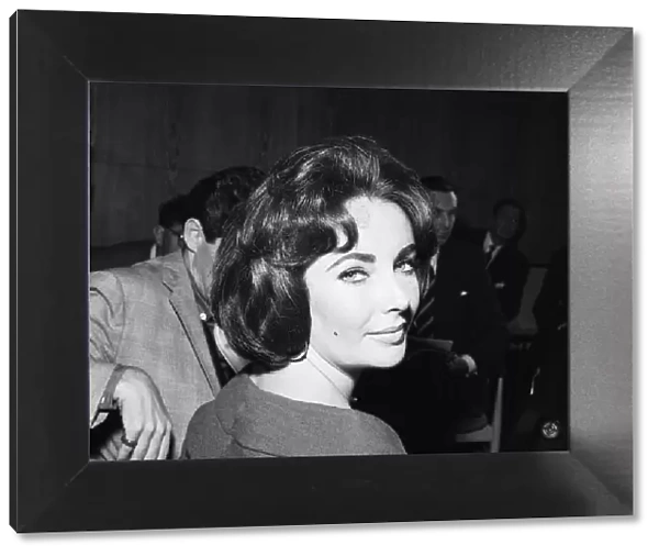 Actress Elizabeth Taylor seen here during a press conference with husband Eddie Fisher