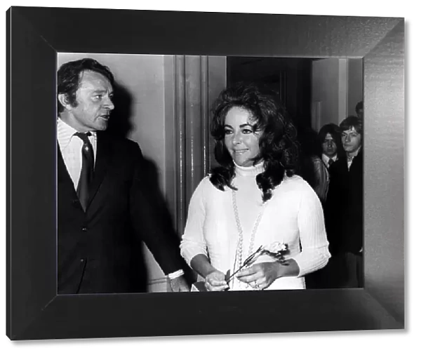 Elizabeth Taylor and Richard Burton leaving Caxton Hall in London after the marriage of