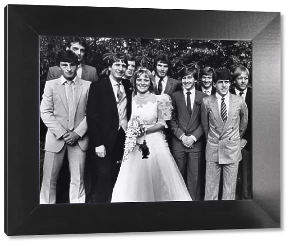 Aston Villa star Gordon Cowans and his bride, Jackie, are surrounded by friends from
