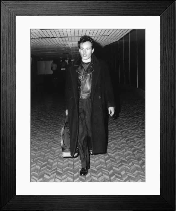 Framed Print : Former pop idol Adam Ant flew home to Britian yesterday to make a comeback as a singer Framed Print : Former pop idol Adam Ant flew home to Britian yesterday to make a comeback as a singer