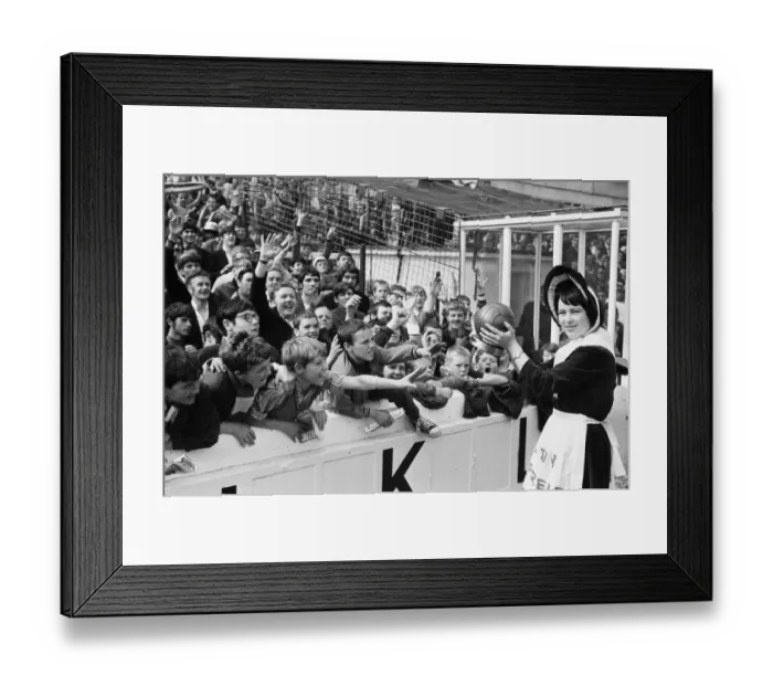 Framed Print : Everton toffee lady, 16 year old Catherine Dunn, holds a trophy presented to Everton Framed Print : Everton toffee lady, 16 year old Catherine Dunn, holds a trophy presented to Everton