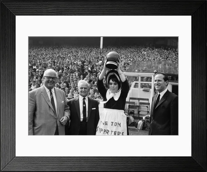 Framed Print : Everton toffee lady, 16 year old Catherine Dunn, holds a trophy presented to Everton Framed Print : Everton toffee lady, 16 year old Catherine Dunn, holds a trophy presented to Everton