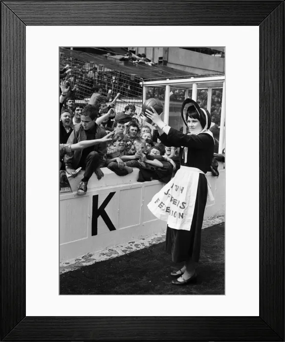 Framed Print : Everton toffee lady, 16 year old Catherine Dunn, holds a trophy presented to Everton Framed Print : Everton toffee lady, 16 year old Catherine Dunn, holds a trophy presented to Everton