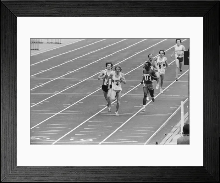 Framed Print : Britains Nick Rose (4) seen here winning the mile from Sean Cahill at the Amoco