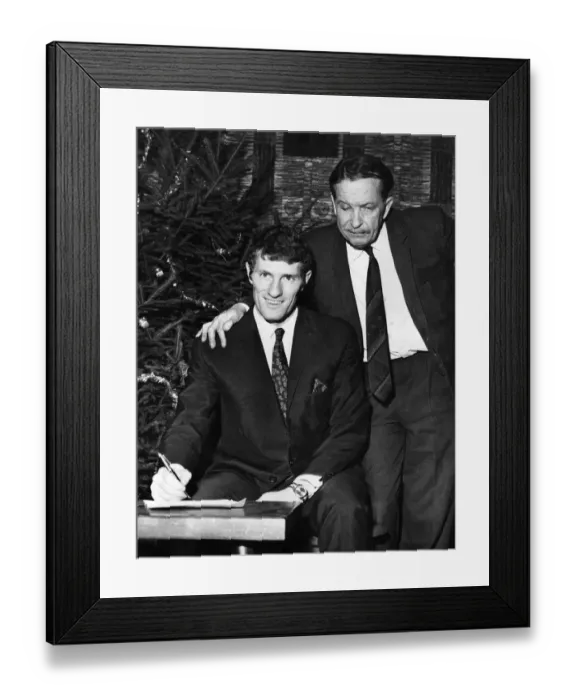 Framed Print : Willie Stevenson. Chairman of State Albert Henshall watches as Wille Stevenson signs for Framed Print : Willie Stevenson. Chairman of State Albert Henshall watches as Wille Stevenson signs for