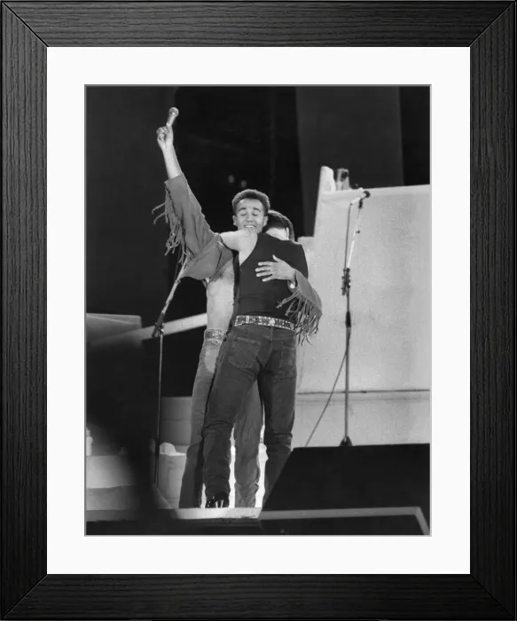 Framed Print : George Michael and Andrew Ridgley (left) of pop duo Wham! on stage for the final embrace Framed Print : George Michael and Andrew Ridgley (left) of pop duo Wham! on stage for the final embrace