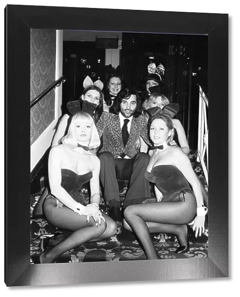 George Best with Playboy Bunnies at The Grosvenor House Hotel in London