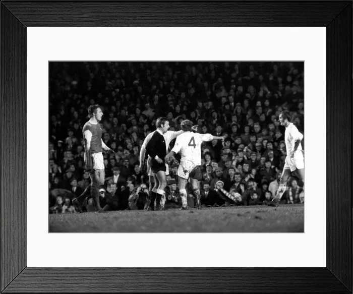 Framed Print : Arsenal vs. Leeds. Leeds players including Peter Lorimer argue with the referee after a Framed Print : Arsenal vs. Leeds. Leeds players including Peter Lorimer argue with the referee after a