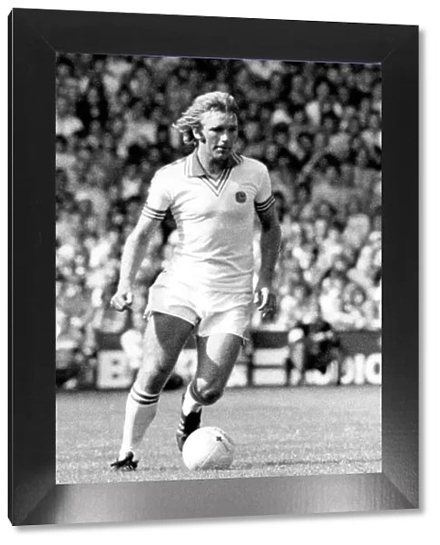 Tony Currie in action for Leeds following his £250