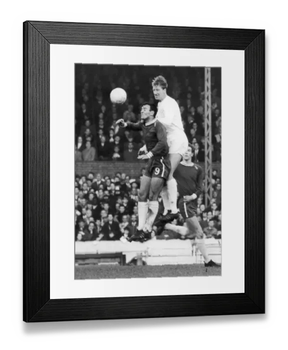 Framed Print : Chelsea v. Leeds. Leeds United player Jackie Charlton out jumps Bridge of Chelsea Framed Print : Chelsea v. Leeds. Leeds United player Jackie Charlton out jumps Bridge of Chelsea