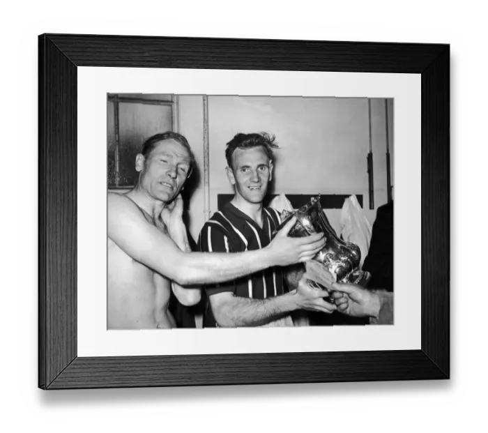 Framed Print : FA Cup Final at Wembley. Manchester City players Bert Traumann and Don Revie with the Cup Framed Print : FA Cup Final at Wembley. Manchester City players Bert Traumann and Don Revie with the Cup