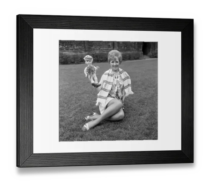Framed Print : Leeds United secretary Janet Rossidale with rosettes of all the teams beaten that season Framed Print : Leeds United secretary Janet Rossidale with rosettes of all the teams beaten that season