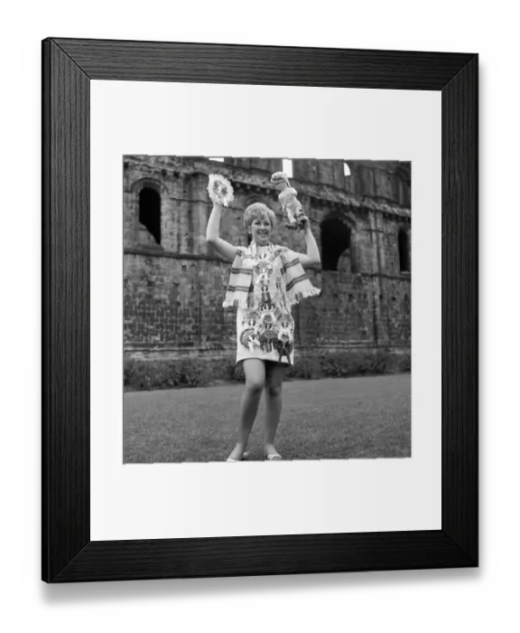 Framed Print : Leeds United secretary Janet Rossidale with rosettes of all the teams beaten that season Framed Print : Leeds United secretary Janet Rossidale with rosettes of all the teams beaten that season