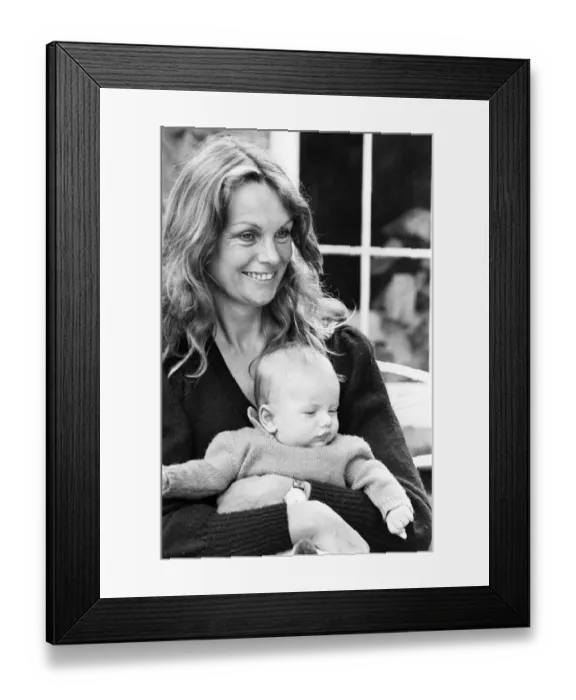 Framed Print : Former model Jean Shrimpton, 36, pictured with baby son Thaddeus, aged 3 months