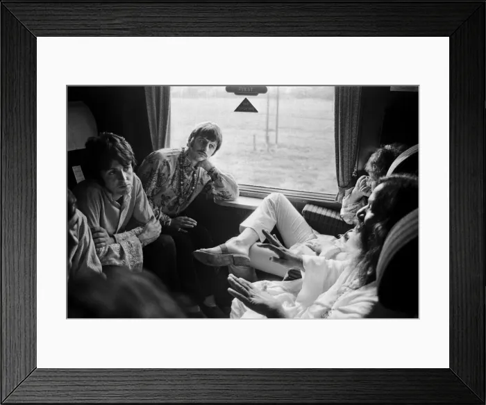 Framed Print : The Beatles with Marhirishi Yogi aboard a train bound for Bangor in North Wales