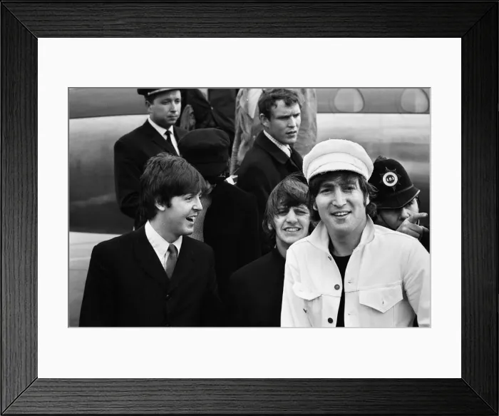 Framed Print : The Beatles at London Heathrow Airport. The Beatles returned home after a Framed Print : The Beatles at London Heathrow Airport. The Beatles returned home after a