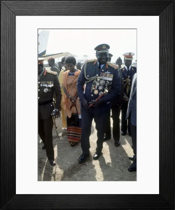 Framed Print : President of Uganda, General Idi Amin, pictured in military uniform attending a military Framed Print : President of Uganda, General Idi Amin, pictured in military uniform attending a military