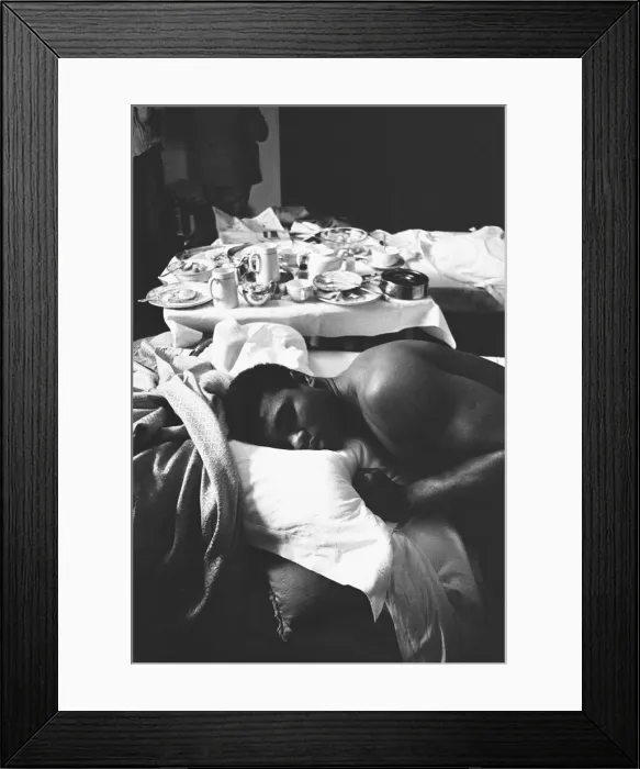 Framed Print : Cassius Clay aka (Muhammad Ali) catches up on some sleep in the Piccadilly Hotel Framed Print : Cassius Clay aka (Muhammad Ali) catches up on some sleep in the Piccadilly Hotel
