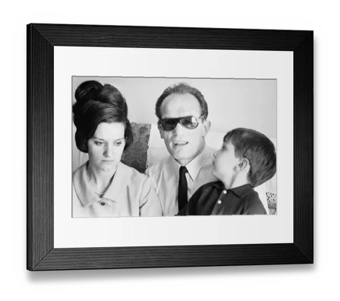 Framed Print : Boxer Henry Cooper seen here with his wife Albina and son following losing his fight with