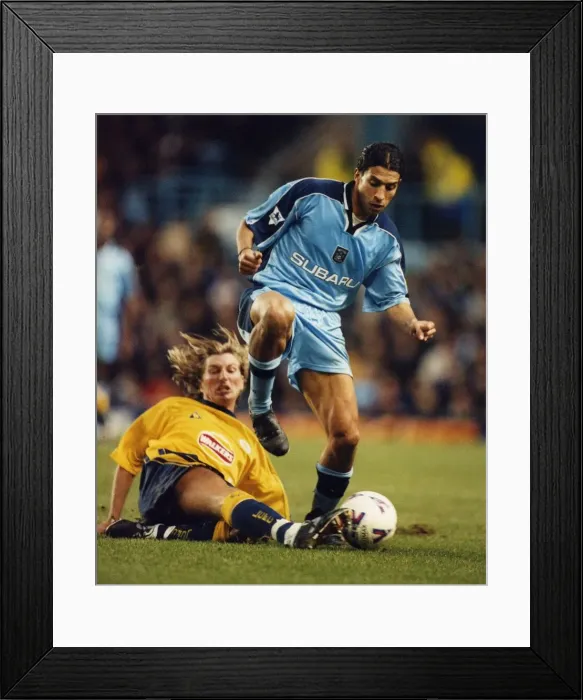 Framed Print : Breaking away: Youssef Chippo is challenged by Robbie Savage