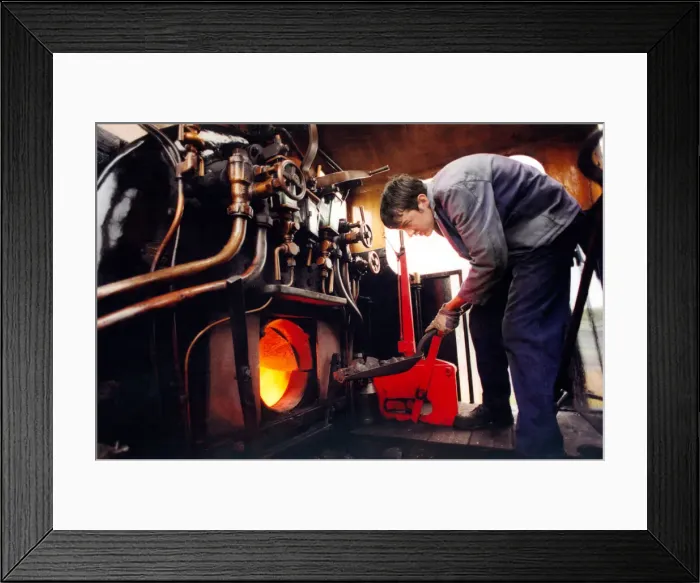 Framed Print : Fireman Andrew Arnold, stokes up the Tanfield Rambler on 28th August 1997 Framed Print : Fireman Andrew Arnold, stokes up the Tanfield Rambler on 28th August 1997