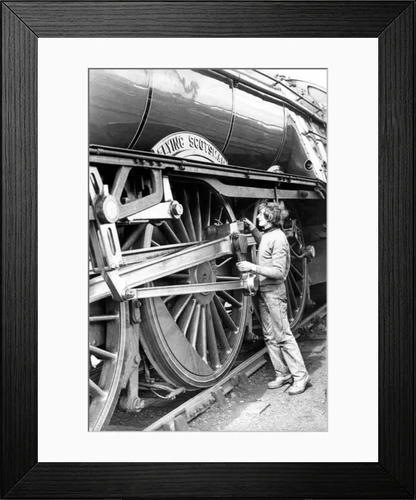 Framed Print : Steve Sandever, job creation supervisor at Cornforth Steam-town checking the lubrication Framed Print : Steve Sandever, job creation supervisor at Cornforth Steam-town checking the lubrication