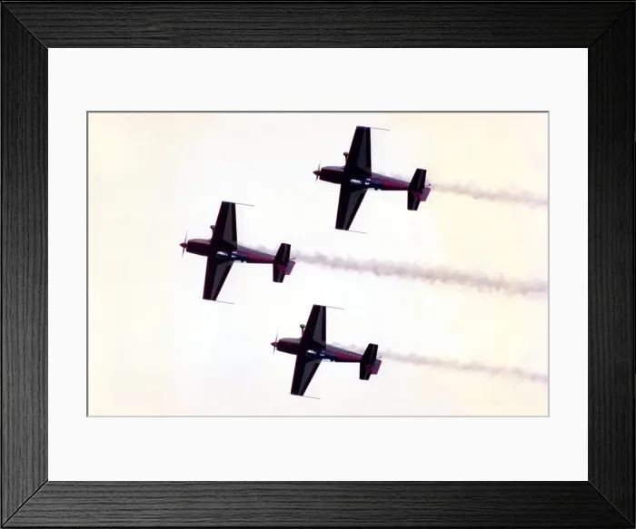 Framed Print : Aircraft from aerobatic display team perform at an airshow