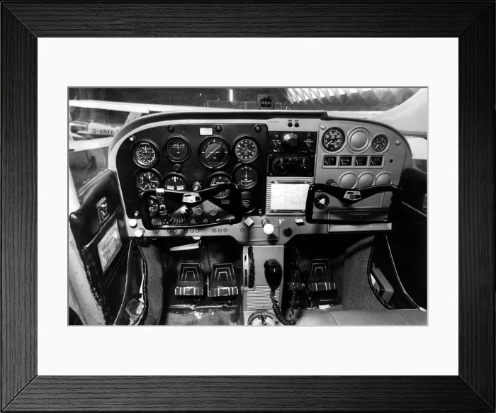 Framed Print : The flight controls in the cockpit of a Cessna light aircraft Framed Print : The flight controls in the cockpit of a Cessna light aircraft