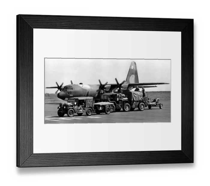 Framed Print : A Lockheed C-130 Hercules arrives at Newcastle Airport carrying American artillerymen for