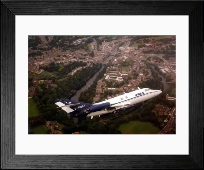 Framed Print : A Dassault Falcon 20 aircraft over Durham Cathedral and city