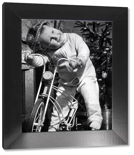 Children: Boy bicycle. December 1952 P024401