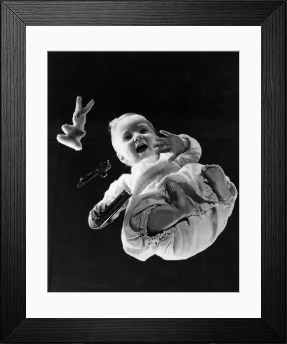 Framed Print : Children Babies: (Picture was taken from underneath a specially constructed transparent