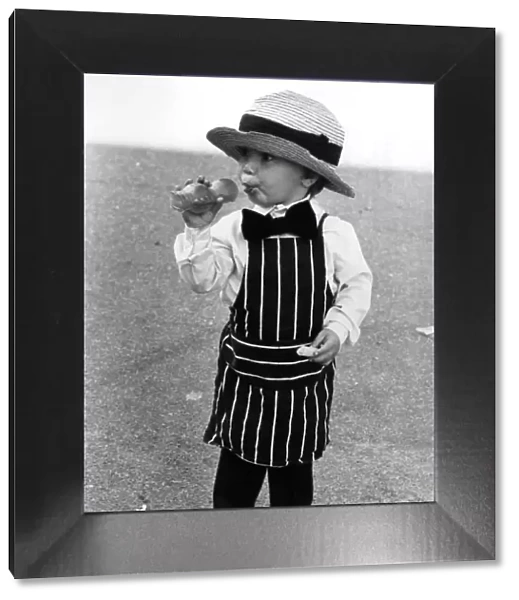 Children: Fancy Dress: Dressed up... Two-year-old butcher boy Darrell Piper