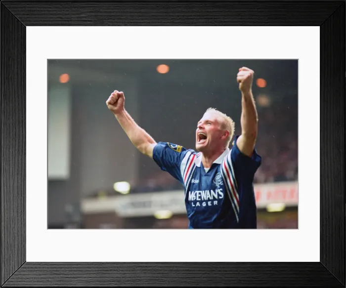 Framed Print : Rangers football player Paul Gascoigne, arms raised in joy after scoring a goal in their Framed Print : Rangers football player Paul Gascoigne, arms raised in joy after scoring a goal in their