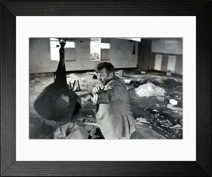 Framed Print : Sport - Boxing - Eddie Thomas takes a final straight jab at the punchbag in what was once Framed Print : Sport - Boxing - Eddie Thomas takes a final straight jab at the punchbag in what was once