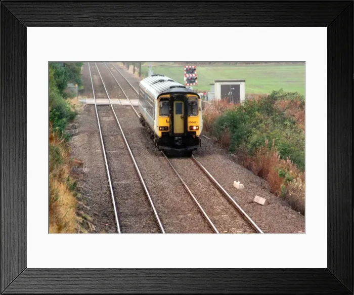 Framed Print : A train on the Newcastle to Carlisle line at Corbridge, Northumberland on 11th October Framed Print : A train on the Newcastle to Carlisle line at Corbridge, Northumberland on 11th October